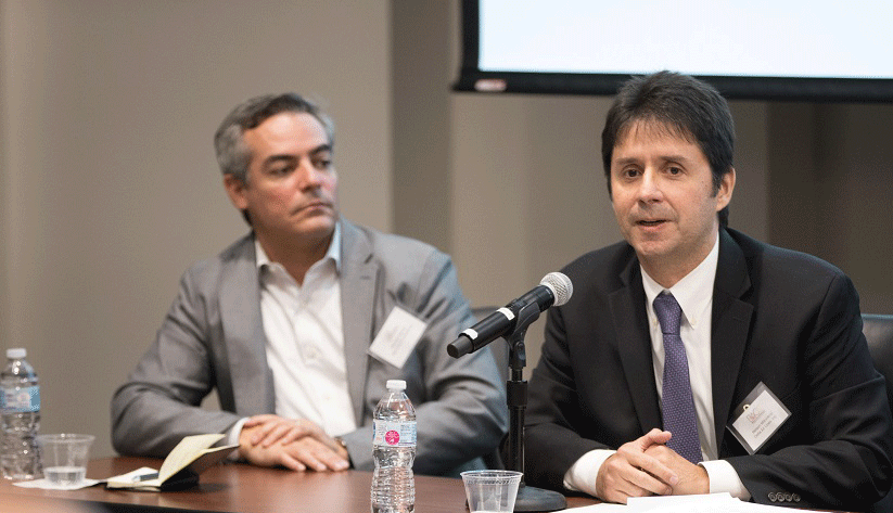 Marcelo Bernal of Merchant e-Solutions, left, and Nelson Mikovenyi of Delta Air Lines speak about business opportunities in Brazil.