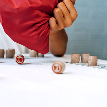 children play russian loto on table