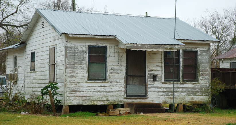 old white run-down house