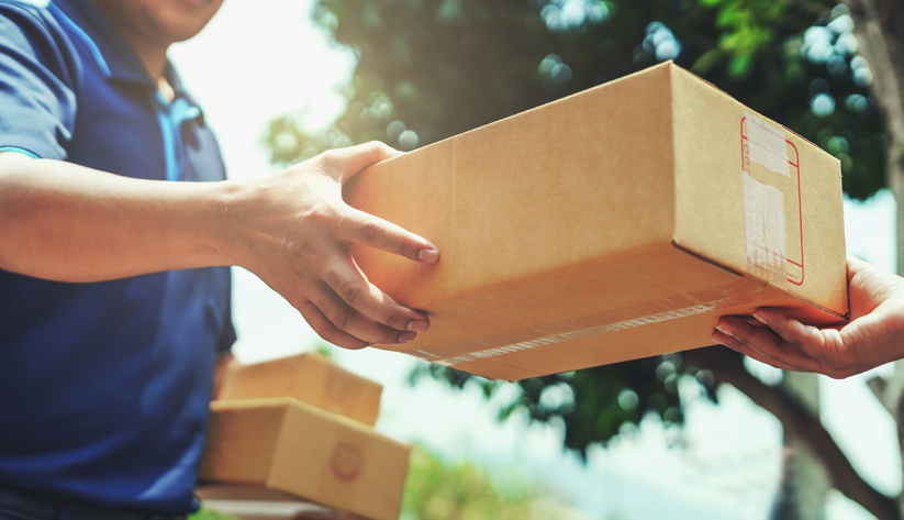 delivery person handing off a package