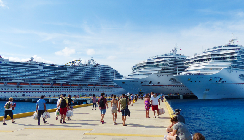 people on the cruise port heading to board cruise ships