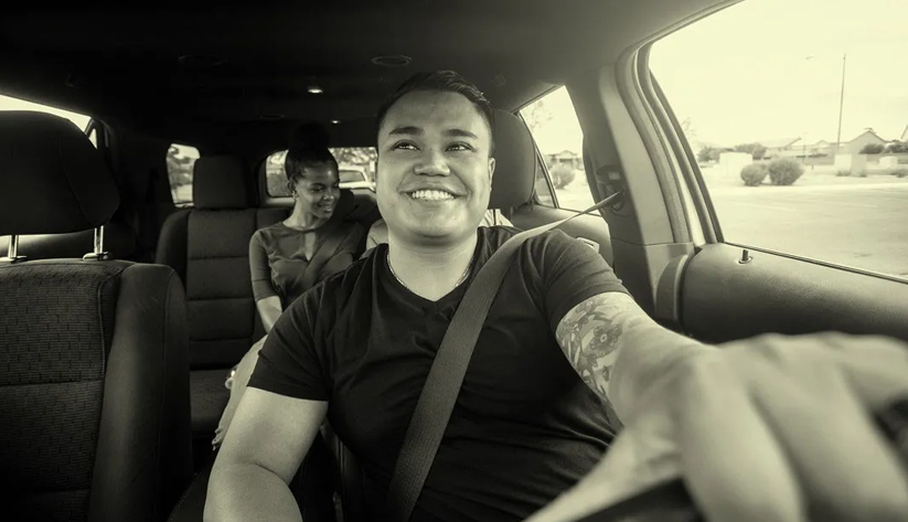 Taxi driver and passenger during ride