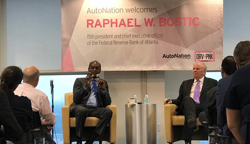 Photo of Raphael Bostic and Mike Jackson during Public Affairs Forum