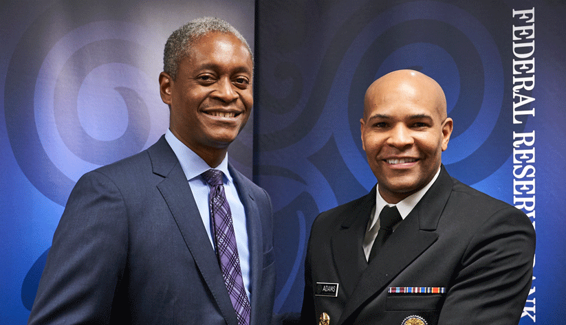 Raphael Bostic, President and Chief Executive Officer of the Atlanta Fed (left) interviewes the U.S. Surgeon General, Jerome Adams.