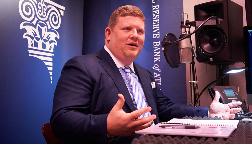 Brian Bailey, a commercial real estate subject matter expert at the Atlanta Fed, during the recording of a podcast episode.