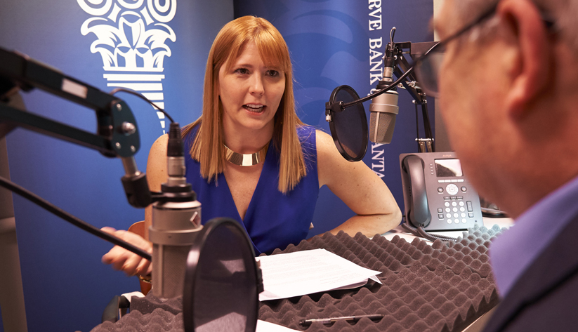 Dave Altig, research director at the Atlanta Fed interviewing Megan Cummings, executive director of the Women's Fund of the Greater Cincinnati Foundation, during the recording of a podcast episode.