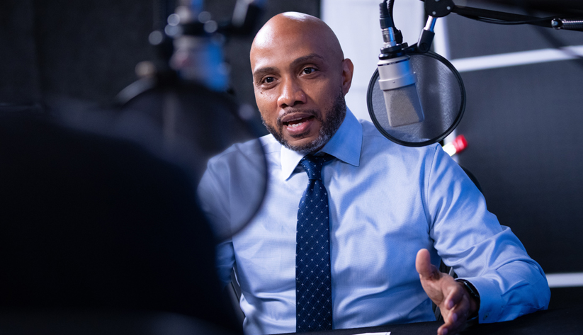 Photo of Domonic Purviance during the recording of the podcast episode. Photo by Stephen Nowland.