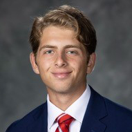 Photo portrait of Aaron Bach, intern in the Economic Survey Research Center.
