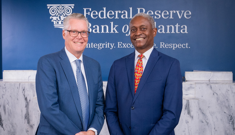 Photo of Raphael Bostic and Delta CEO Ed Bastian