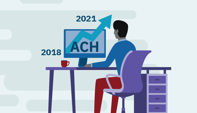 person seated at screen with upward trajectory line chart starting in 2018 ending in 2021