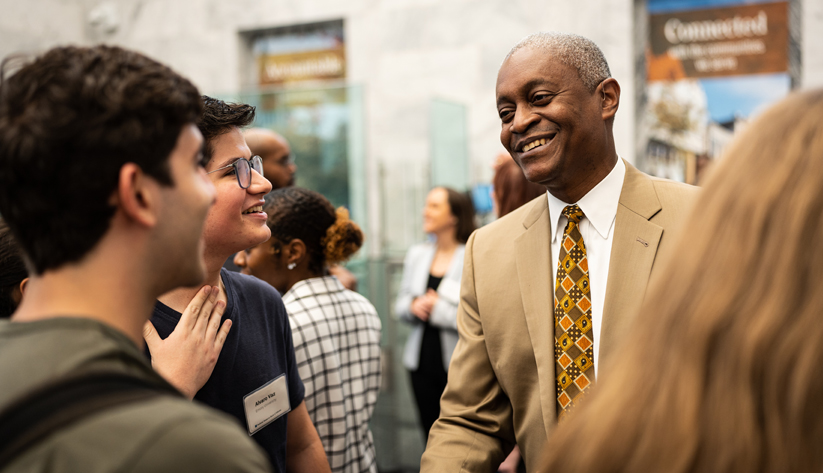 Raphael Bostic meets with college students