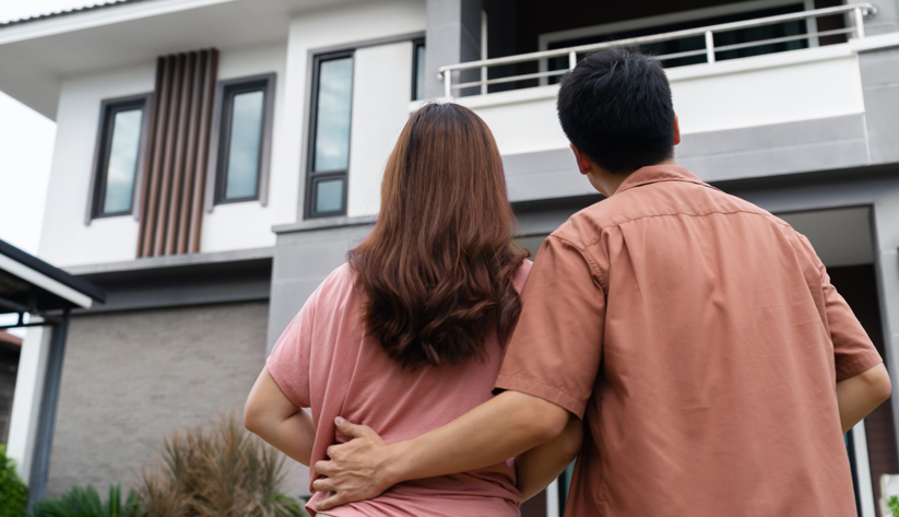 couple looking at a house