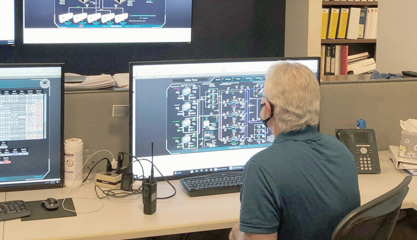 man looking at computer screen