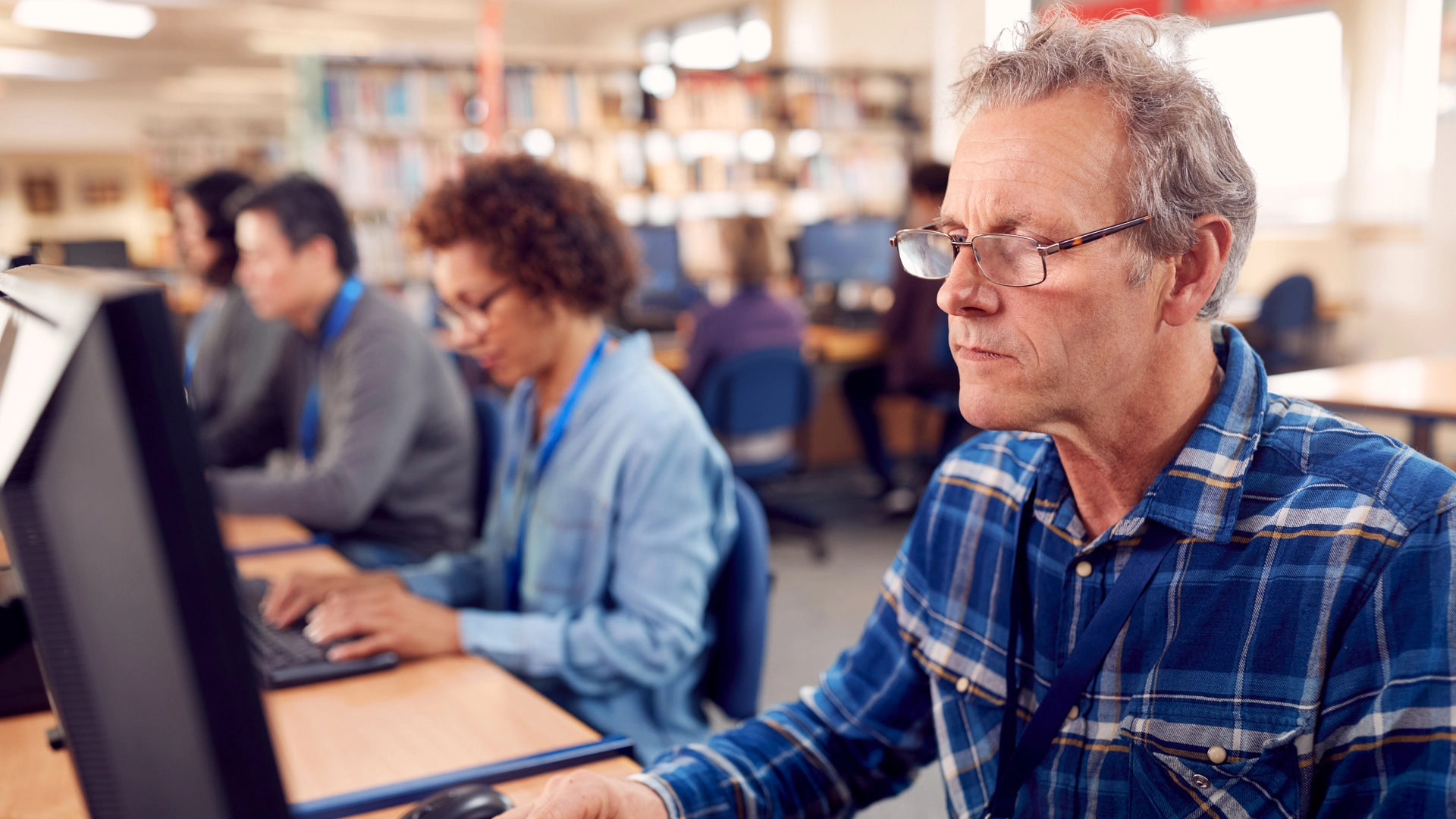 people using the public computers at the library