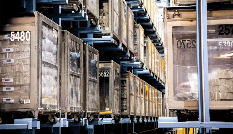 cash buses stacked inside the vault