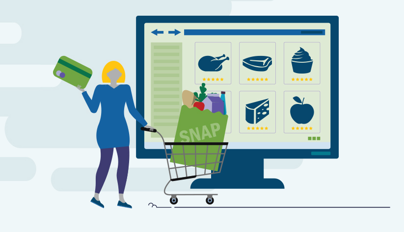 woman holding credit card pushing grocery cart in front of large computer screen
