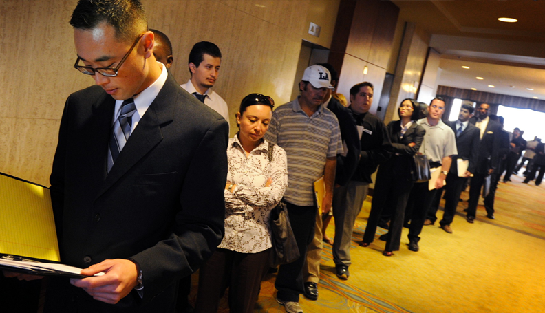people holding resumes lining up to apply for jobs