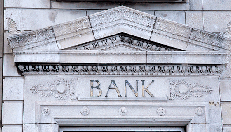 exterior of bank constructed of marble with the word "bank" photographed head on