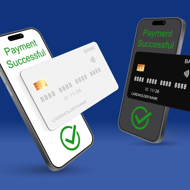 A pair of smartphones display "Payment Successful" while white and black credit cards appear in front of them.