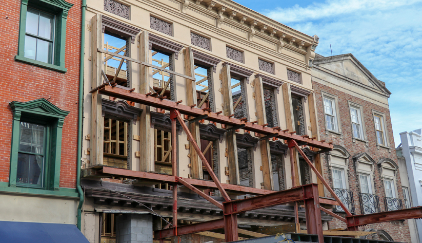 exterior of multi-unit housing undergoing renovations
