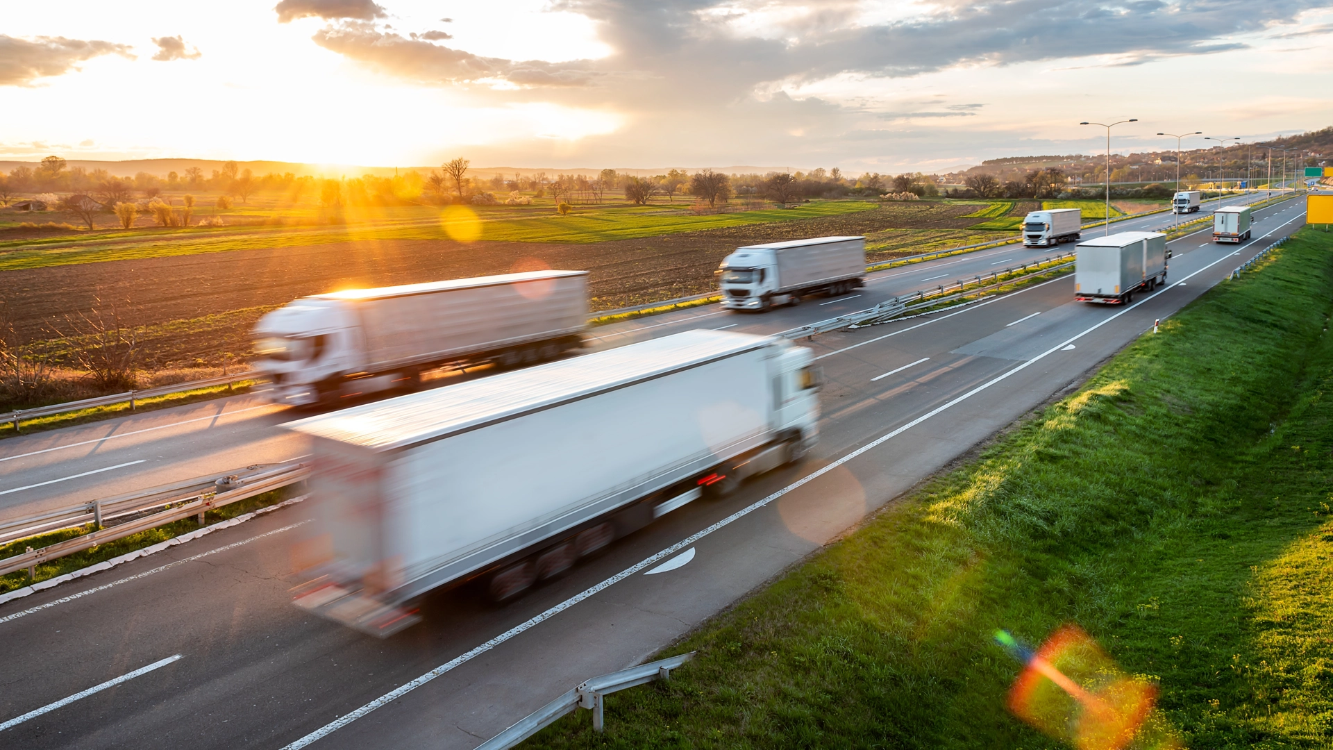 Semi trucks driving on a highway