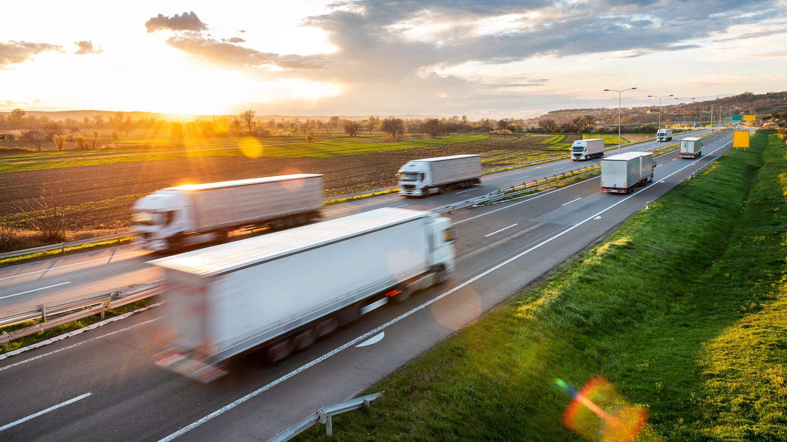 Semi trucks driving on a highway