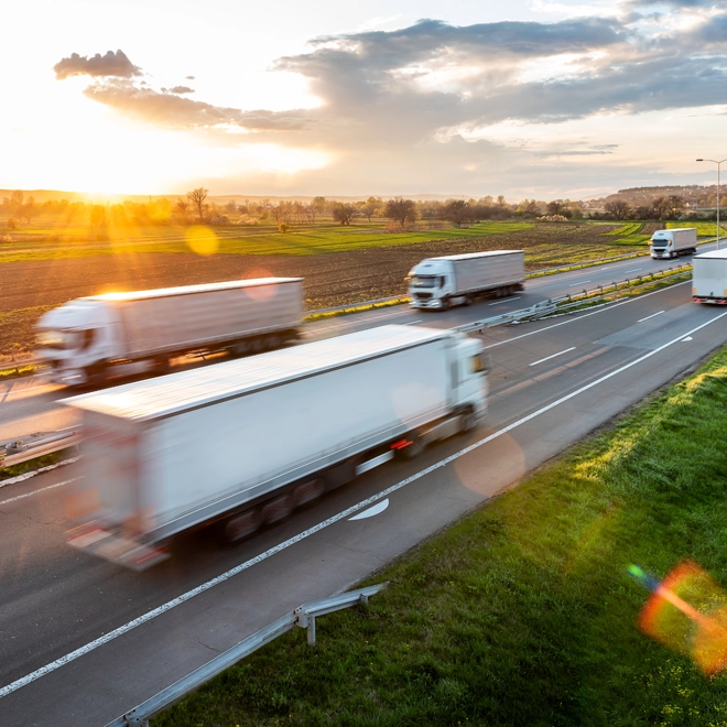 Semi trucks driving on a highway