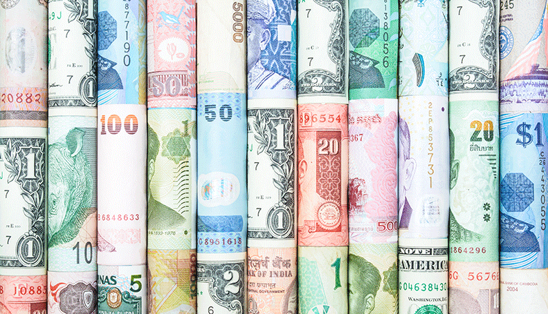 international paper currencies each rolled up