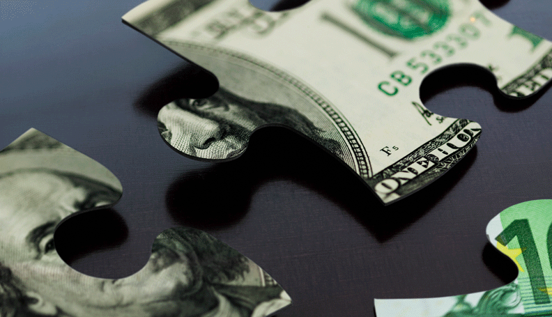 puzzle pieces, not quite joined, in the form of dollar bill