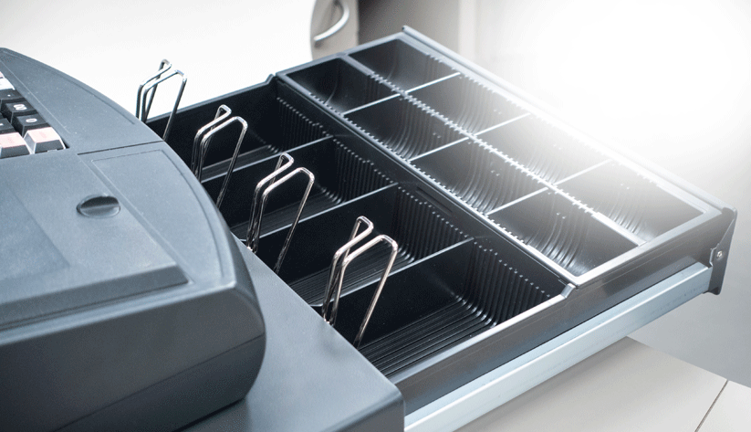 open cash register with empty drawer