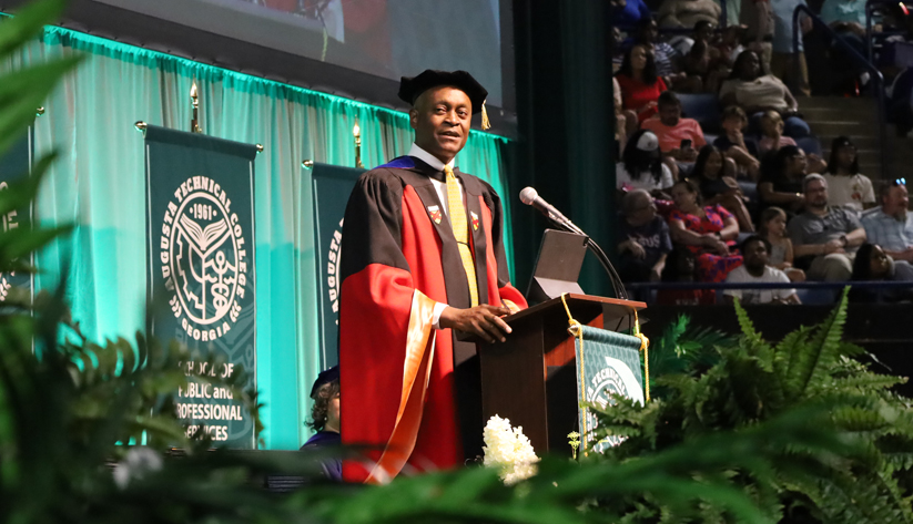 Photo of Raphael Bostic speaking at commencement ceremony