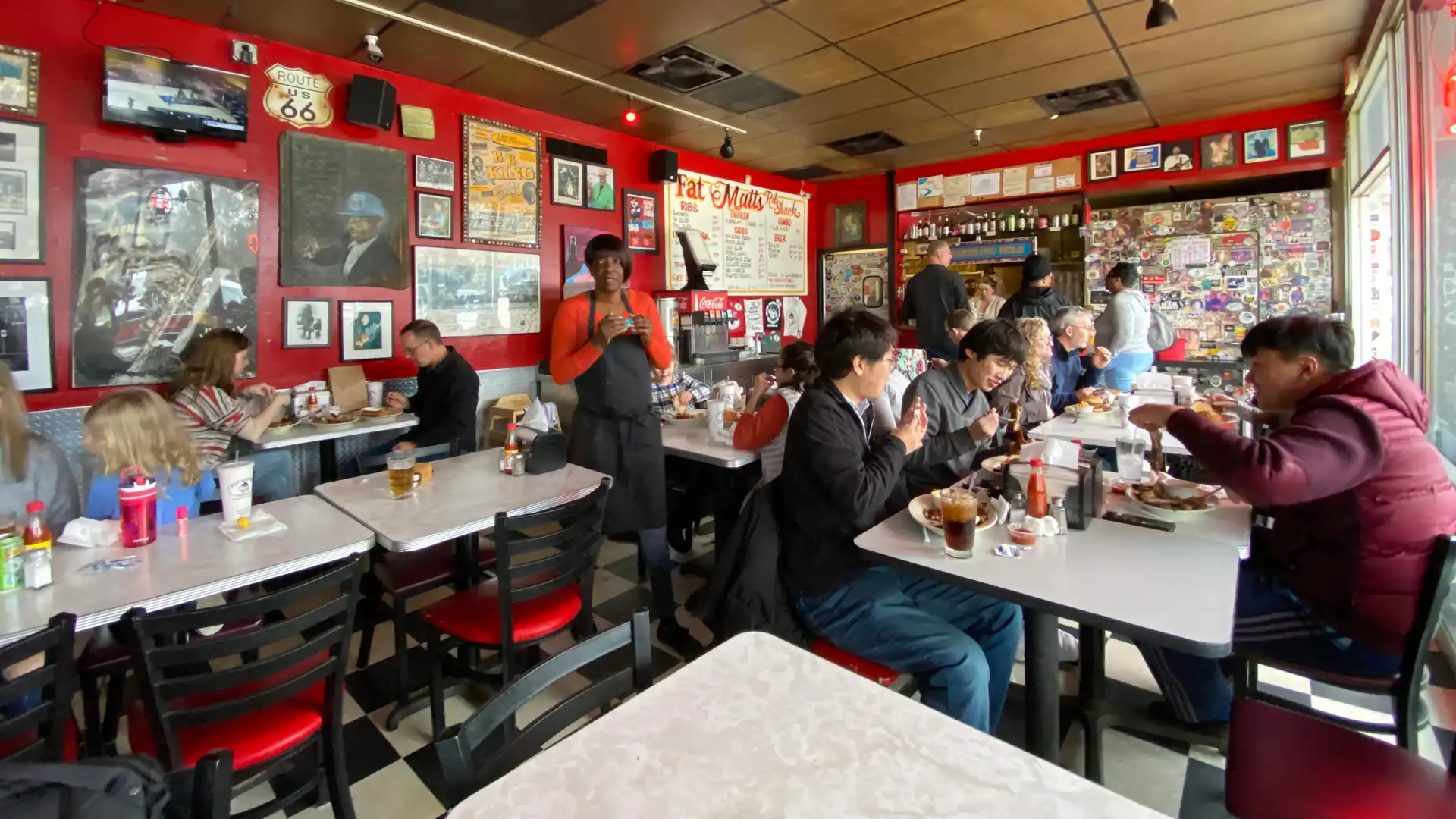 Waitress waiting on customers in a restaurant