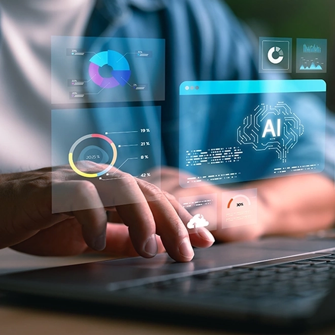 A worker uses a laptop computer to run various applications
