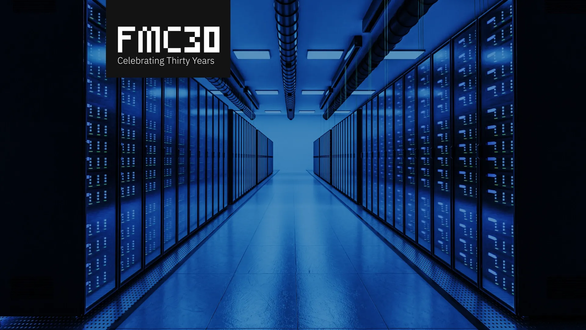 Row of servers in a data center with blue glow with FMC30 logo