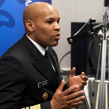 U.S. Surgeon General, Jerome Adams during the recording of a podcast episode.