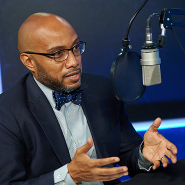 photo of the Atlanta Fed's Domonic Purviance at the recording of a podcast episode. Photo by Stephen Nowland