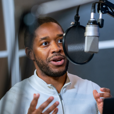 Photo of Nye Hodge during the recording of the podcast episode. Photo by Stephen Nowland.