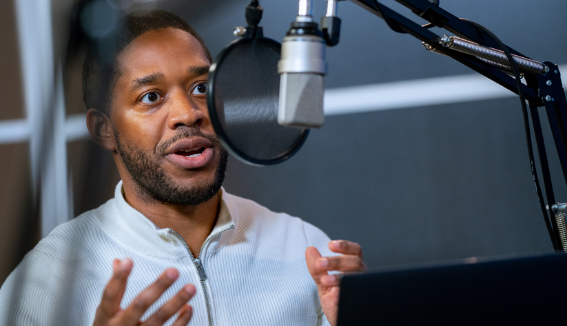 Photo of Nye Hodge during the recording of the podcast episode. Photo by Stephen Nowland.