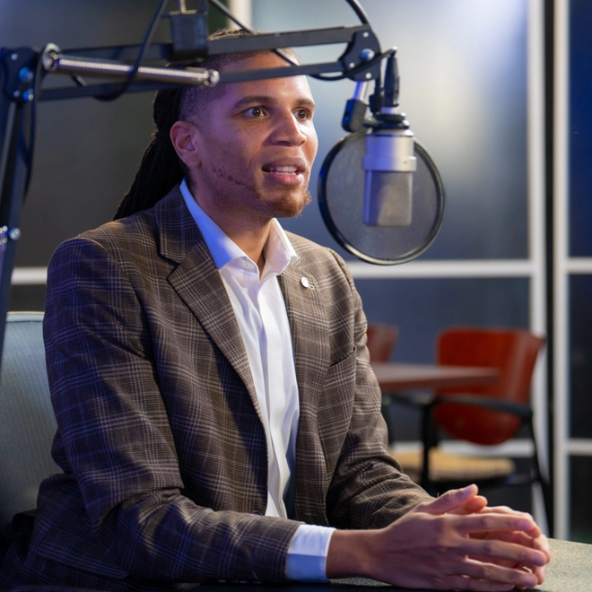 The Atlanta Fed's Dontá Council during the recording of a podcast episode. Photo by Stephen Nowland.