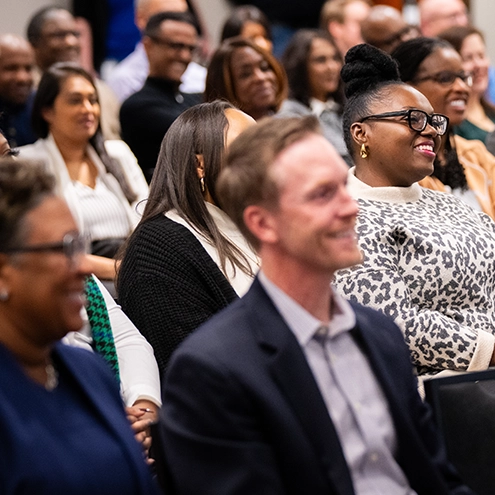 people in the audience smiling
