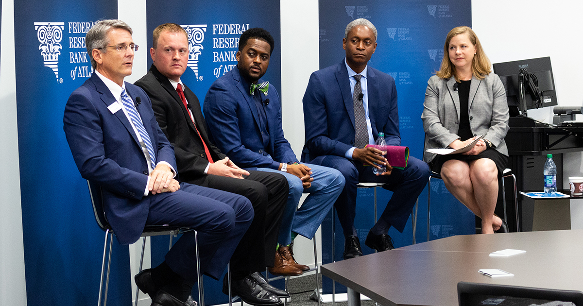 Photo: Jay Forrester, Ryan Hawk, Hawthorne Welcher Jr., Raphael Bostic, and Michelle Bowman (l-r) discuss the grassroots effects of monetary policy. Photo by Odie Swanegan