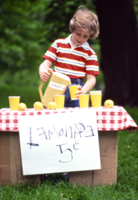 boy selling lemonade