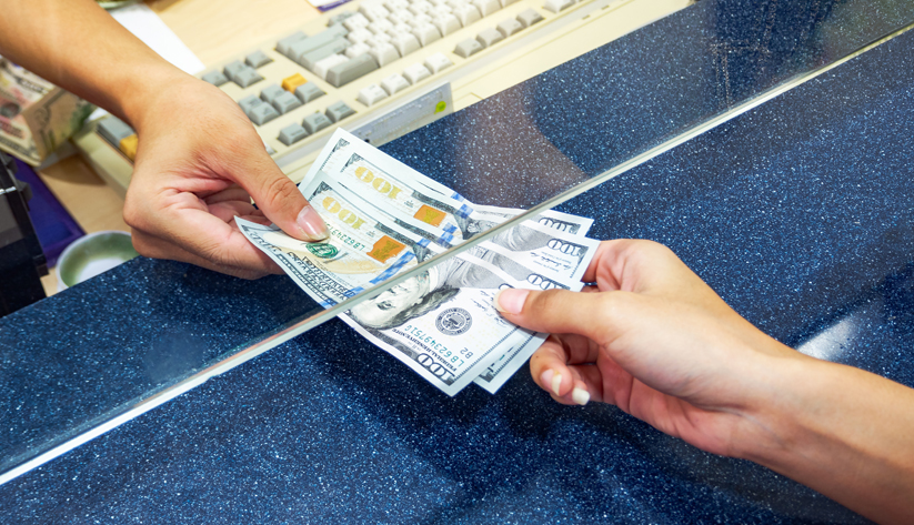hands exchanging money