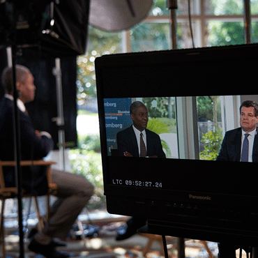 image of interview of Raphael Bostic being video taped