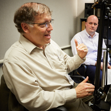 Photo of Steven Fazzari and Stuart Andreason during a podcast about solutions to income inequality